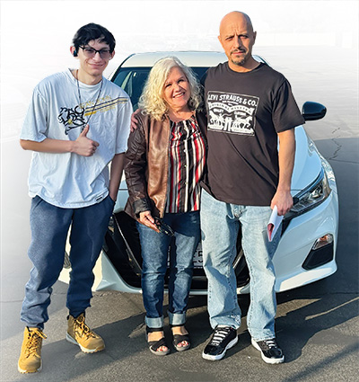 The Martinez family got an auto loan with First City and help from Enterprise Car Sales.